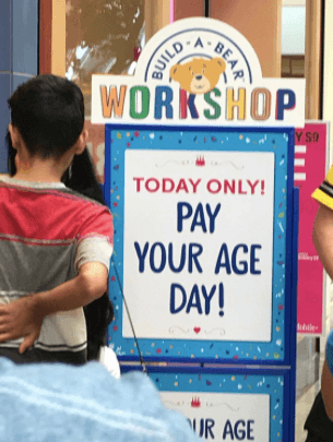 Build-a-Bear Workshop Pay Your Age Front of Store Sign