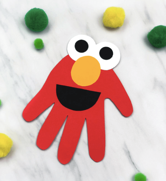 Celebrate Elmo's Birthday with this Elmo Handprint Craft from Simple Everyday Mom