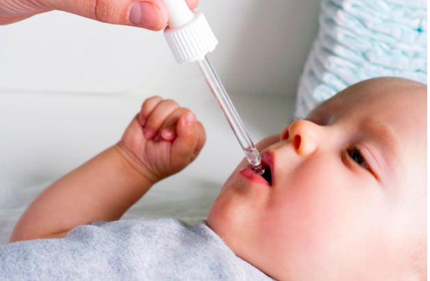 Using a Dropper to Give Multi Vitamin to Baby